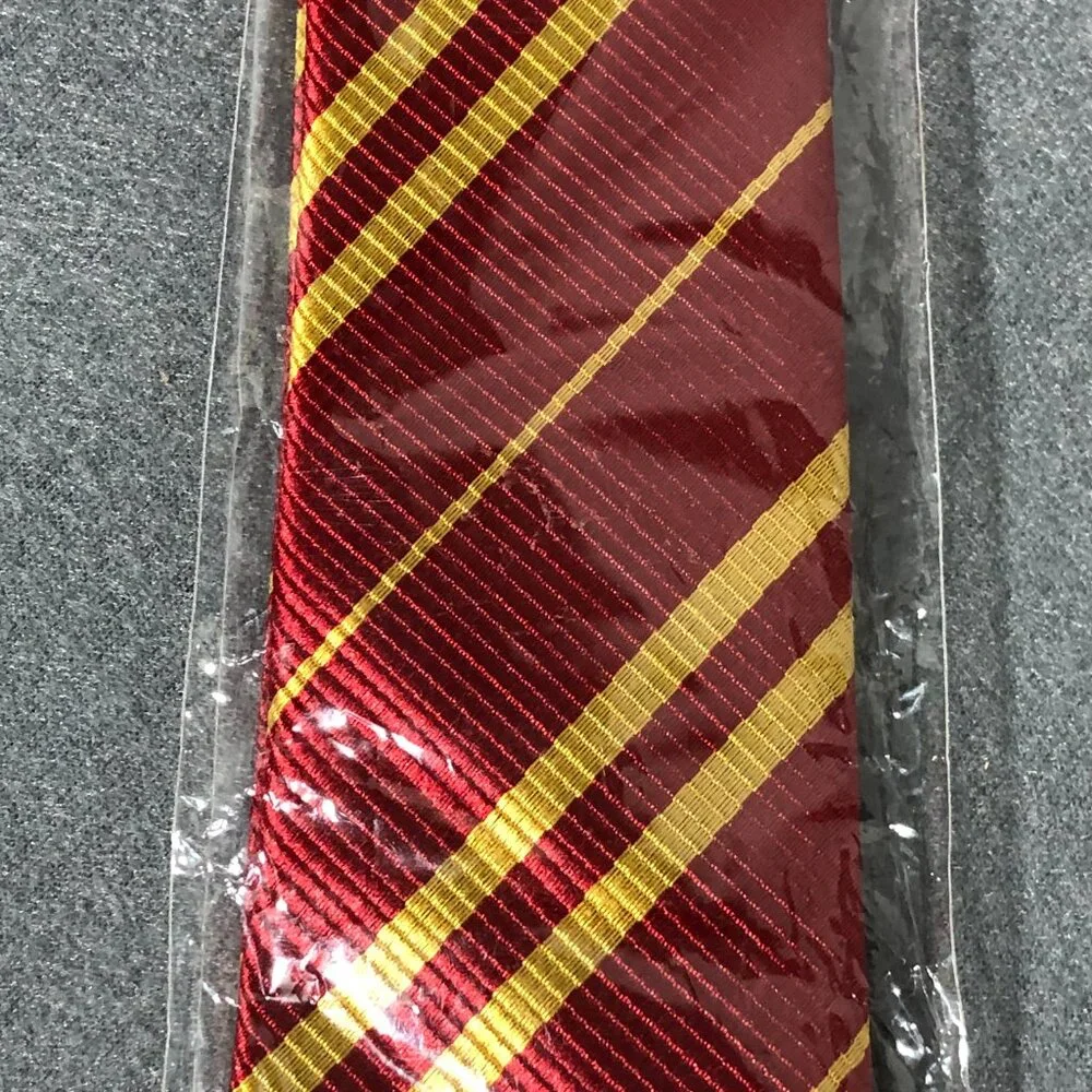 Hogwarts School Of Witchcrafts And Wizardly Note Book and uniform Tie